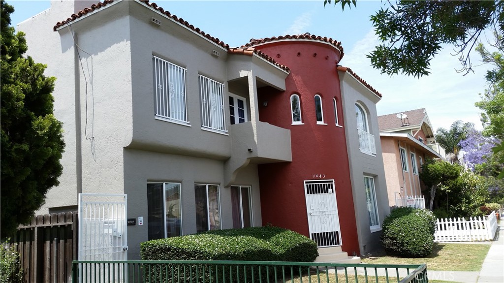 1043 Stanley Avenue Long Beach, CA 90804 - Photo 1 of 16 a front view of a house with a yard