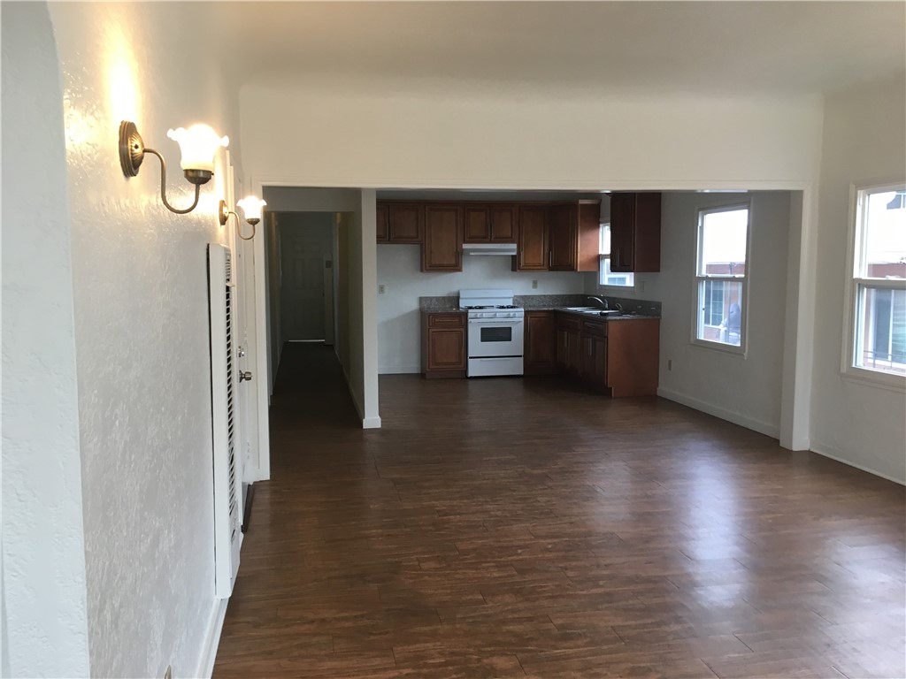 1043 Stanley Avenue Long Beach, CA 90804 - Photo 5 of 16 a view of a kitchen from the hallway