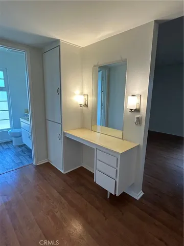 a bathroom with a sink a toilet and tub