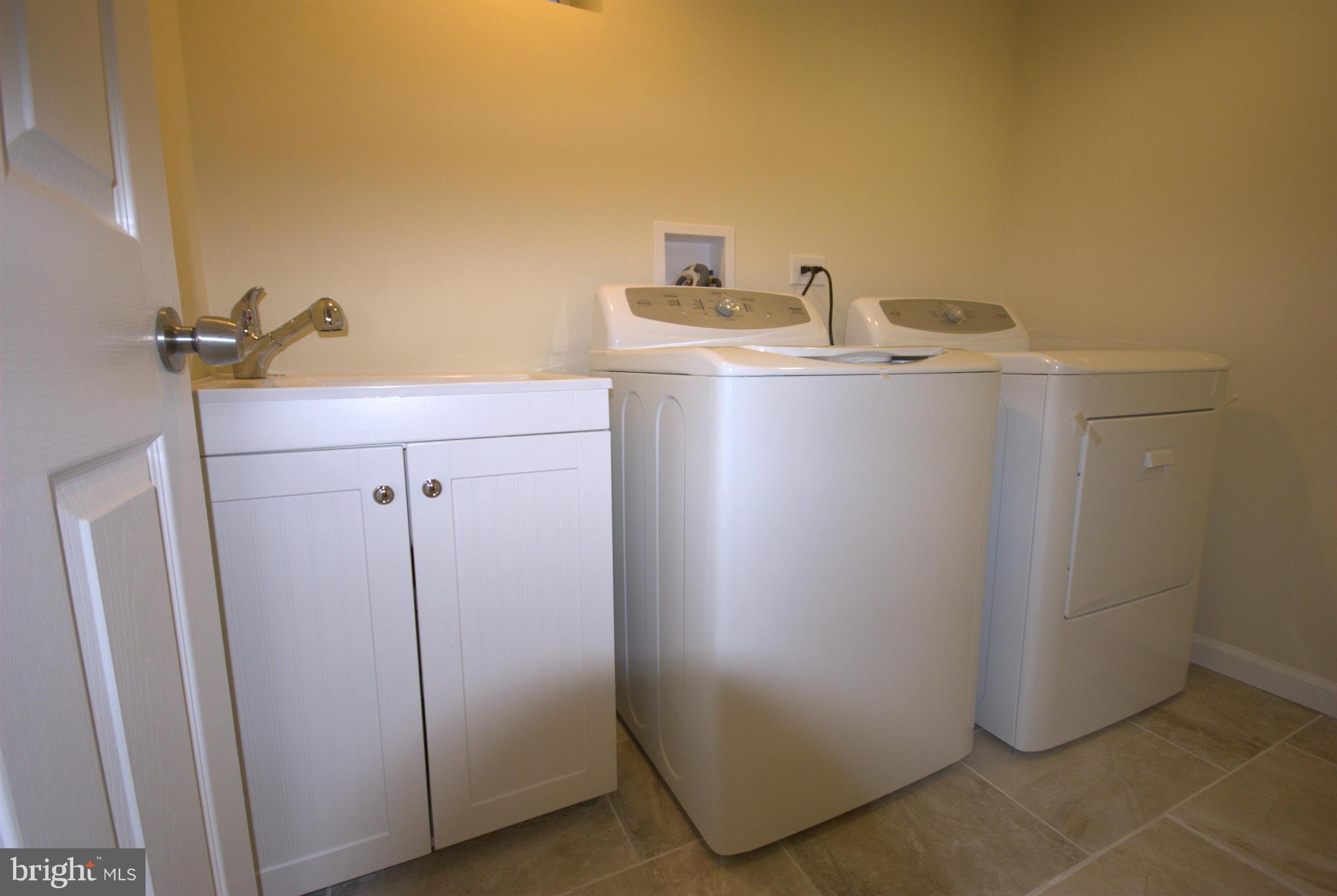 8538 Lucerne Road Randallstown, MD 21133 - Photo 14 of 16 a utility room with dryer and washer