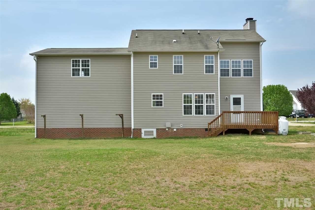 5609 Cardinal Landing Drive Raleigh, NC 27603 - Photo 22 of 22 front view of a house with a yard