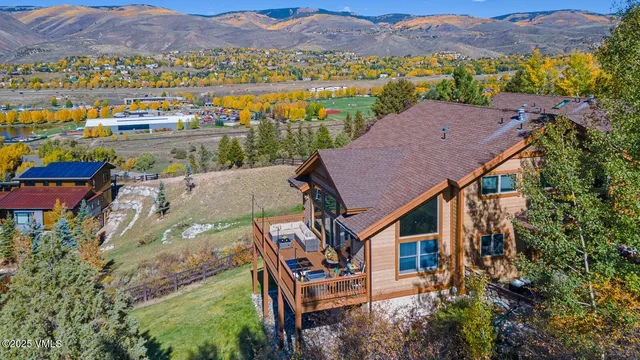 an aerial view of residential houses and outdoor space