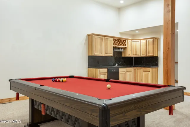 a room with pool table