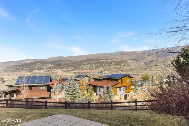 an aerial view of residential houses and outdoor space