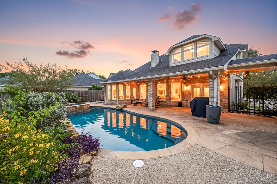 22610 Shallow Spring Court Katy, TX 77494 - Photo 1 of 45 a view of a swimming pool with sitting area