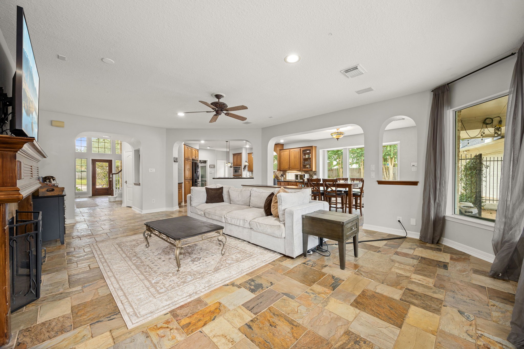 22610 Shallow Spring Court Katy, TX 77494 - Photo 15 of 45 a living room with furniture and a wooden floor