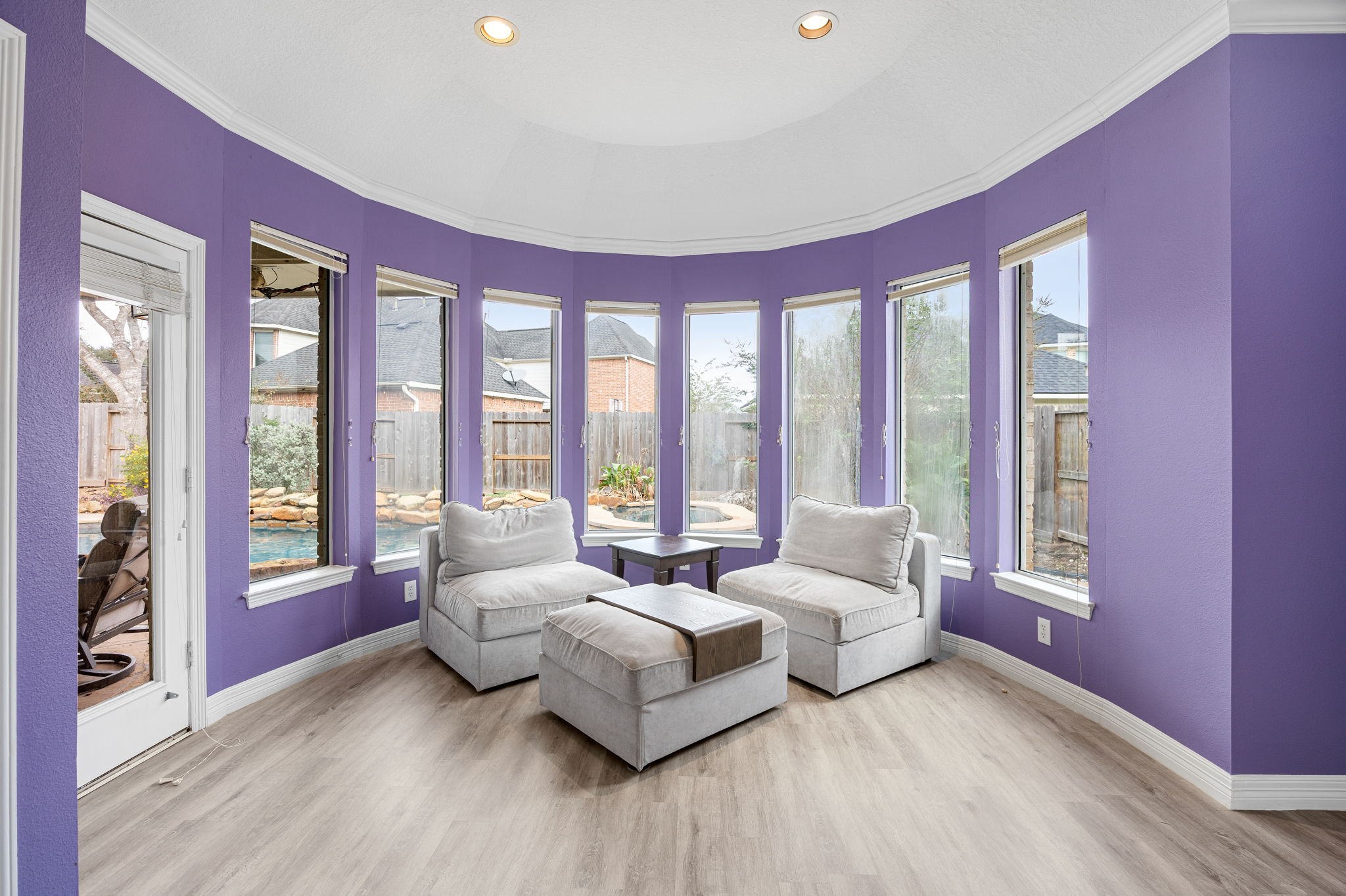 22610 Shallow Spring Court Katy, TX 77494 - Photo 17 of 45 a living room with furniture and large windows