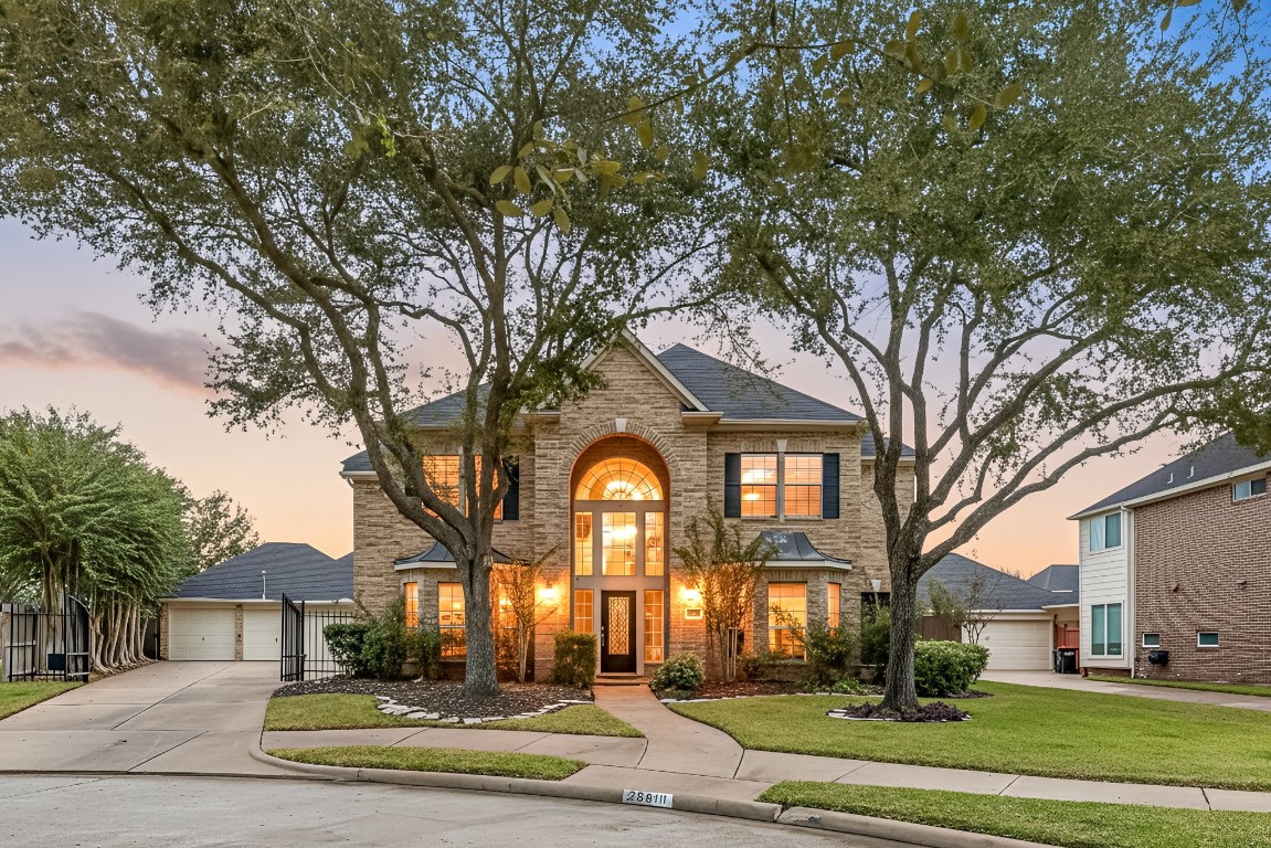 22610 Shallow Spring Court Katy, TX 77494 - Photo 2 of 45 a front view of a house with a yard