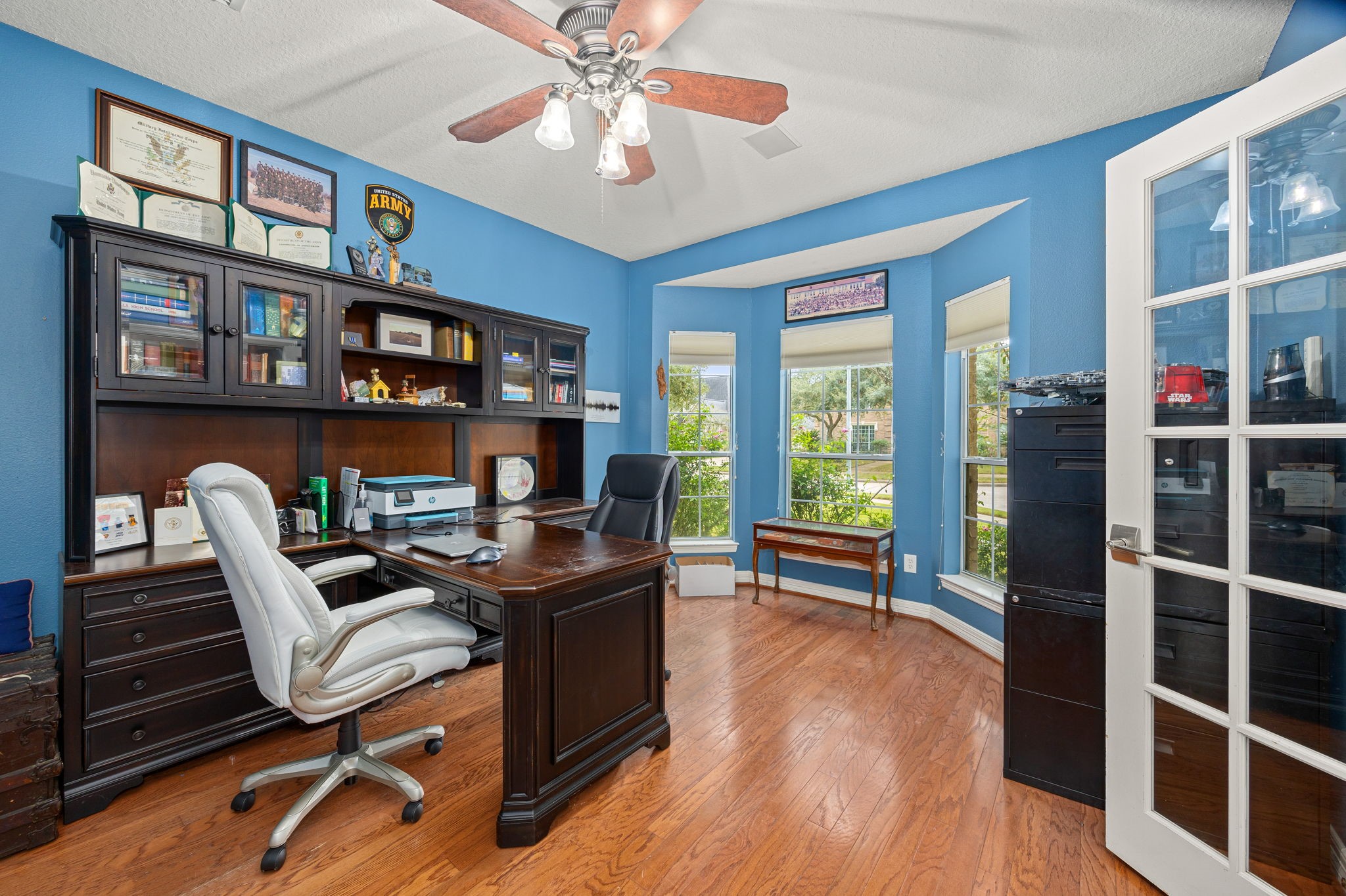 22610 Shallow Spring Court Katy, TX 77494 - Photo 21 of 45 a work room with furniture windows and wooden floor