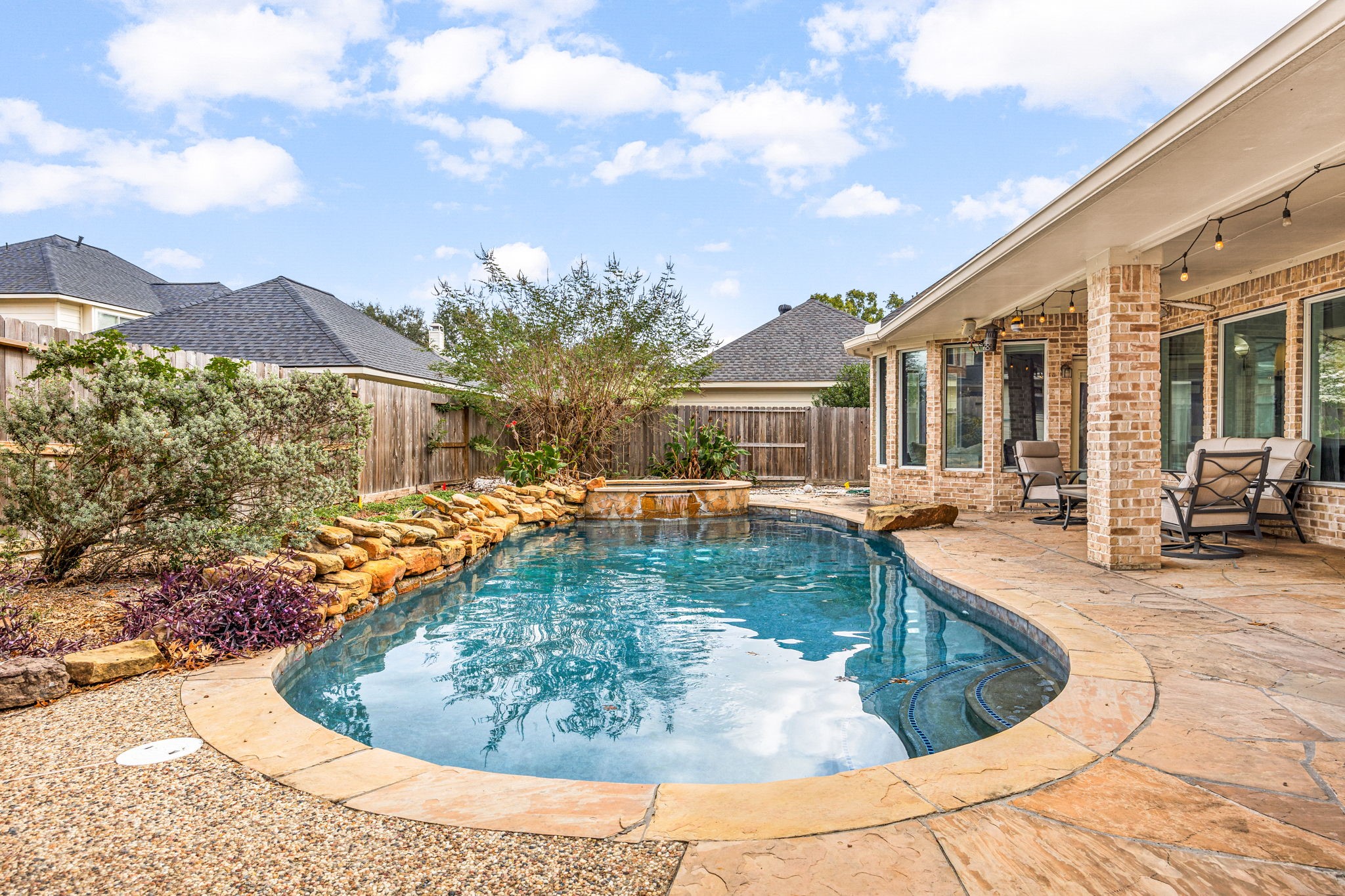 22610 Shallow Spring Court Katy, TX 77494 - Photo 25 of 45 a view of a house with swimming pool and sitting area
