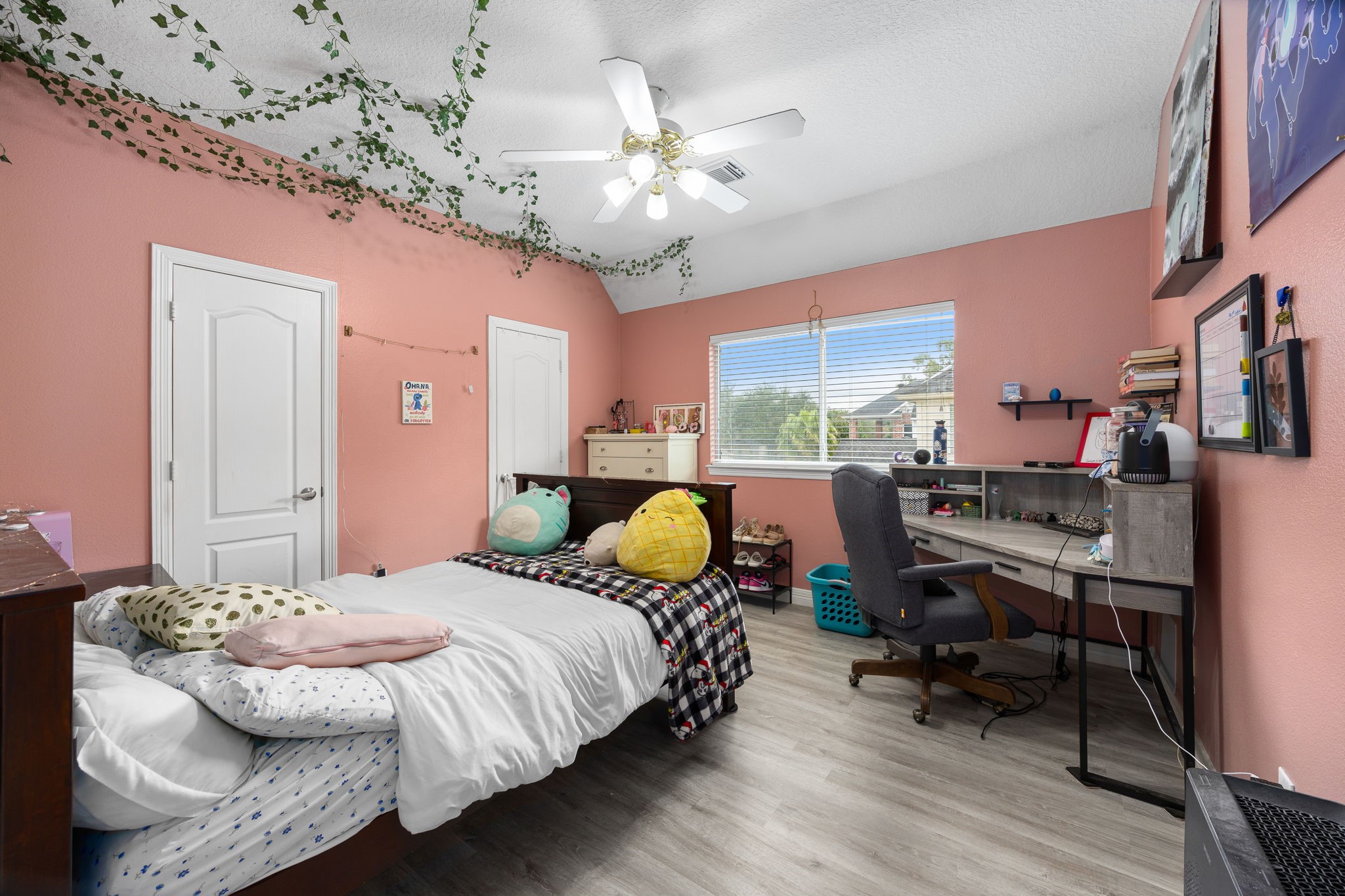 22610 Shallow Spring Court Katy, TX 77494 - Photo 38 of 45 a bedroom with a bed a large window and furniture