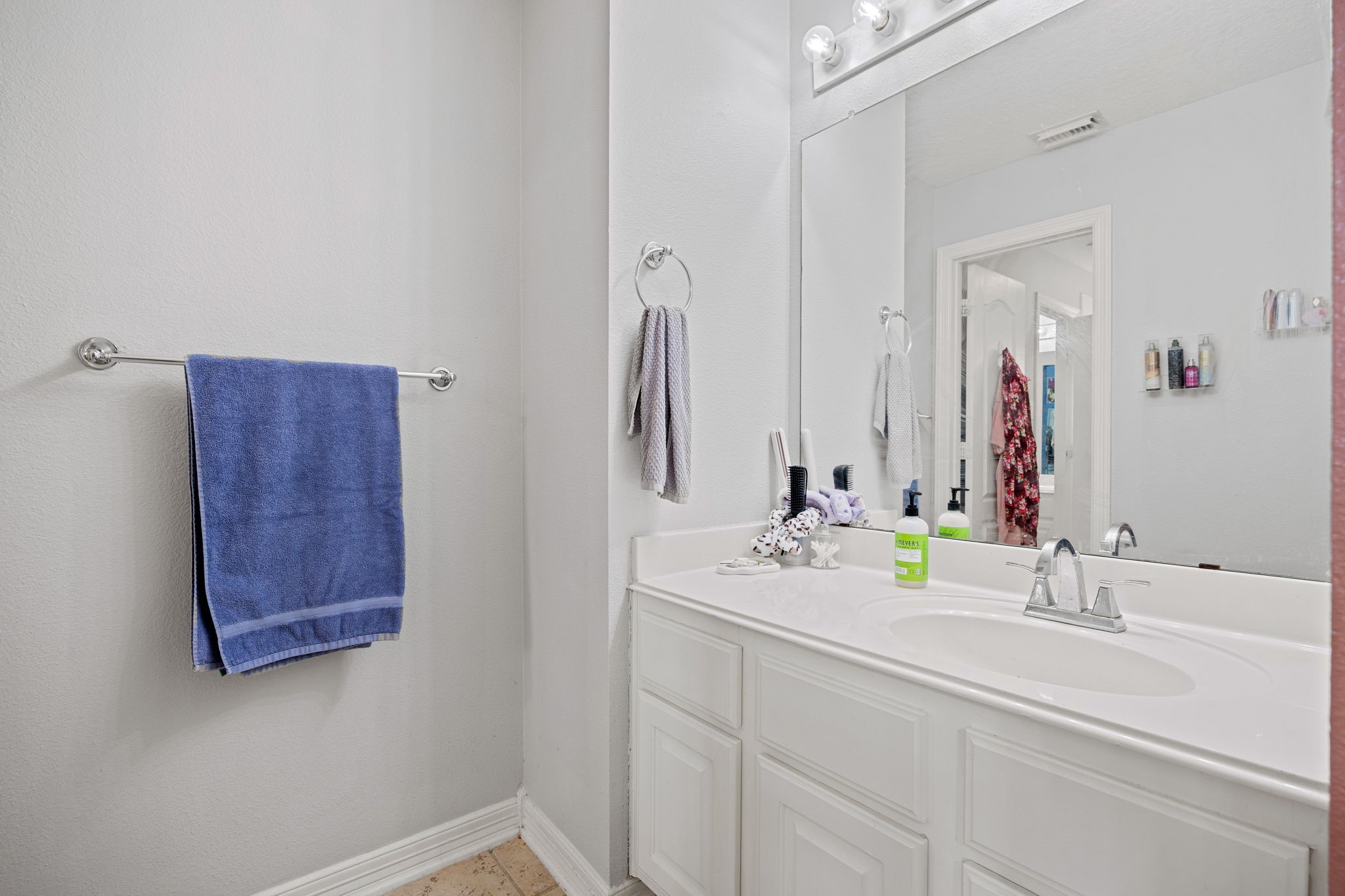 22610 Shallow Spring Court Katy, TX 77494 - Photo 39 of 45 a bathroom with a double vanity sink and a mirror