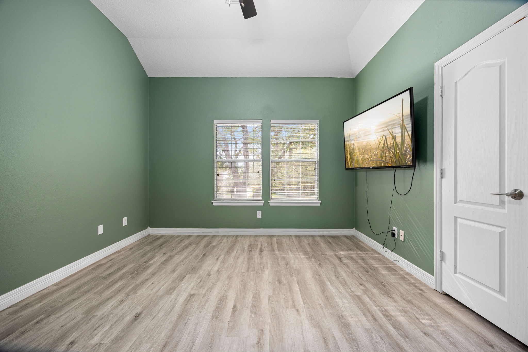 22610 Shallow Spring Court Katy, TX 77494 - Photo 42 of 45 a view of room with window and wooden floor