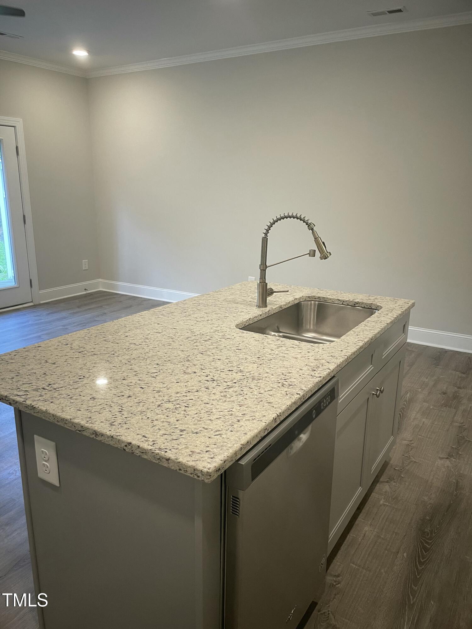 5502 Batoul Lane Raleigh, NC 27606 - Photo 11 of 35 a close view of sink and tap