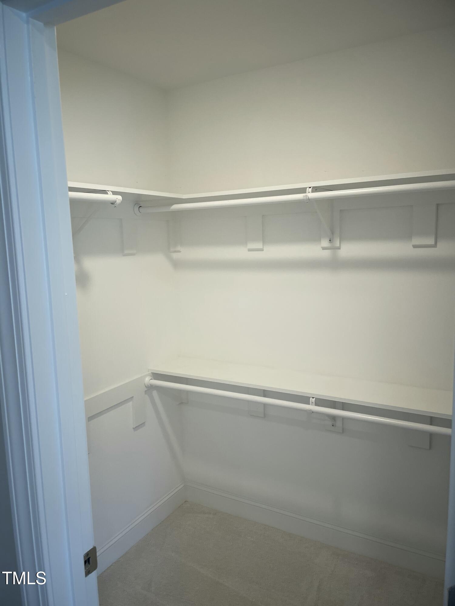 5502 Batoul Lane Raleigh, NC 27606 - Photo 23 of 35 a view of an empty walk in closet