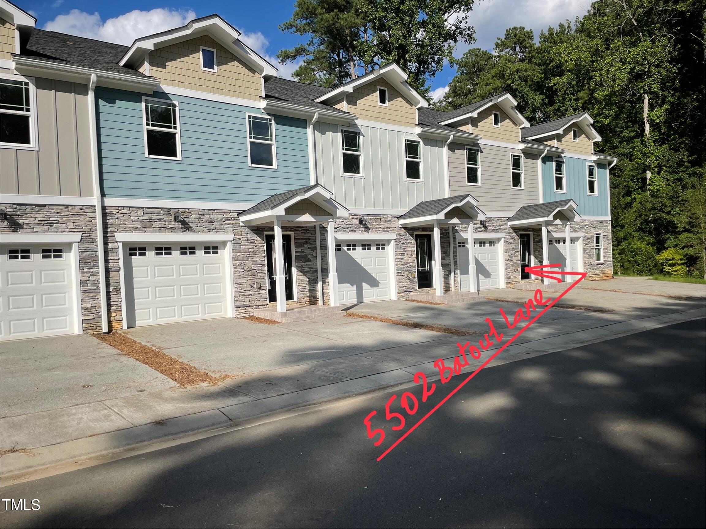 5502 Batoul Lane Raleigh, NC 27606 - Photo 3 of 35 a front view of multiple houses