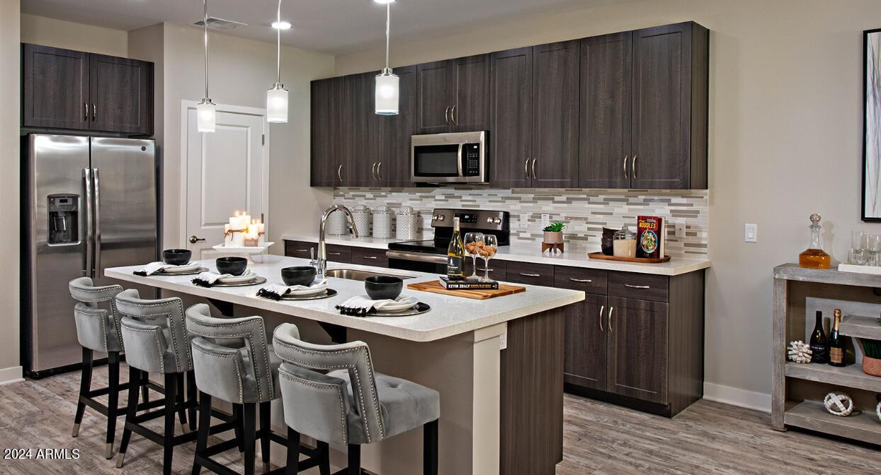 5550 East Deer Valley Drive, Unit 1J Phoenix, AZ 85054 - Photo 3 of 9 Kitchen