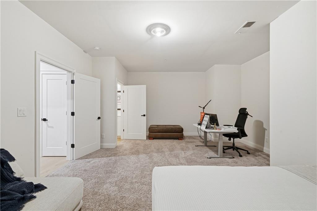 320 Concord Street Alpharetta, GA 30009 - Photo 22 of 48 a living room with furniture and a window