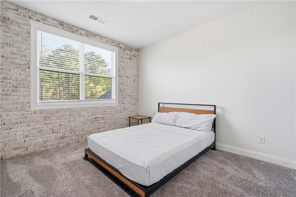 320 Concord Street Alpharetta, GA 30009 - Photo 23 of 48 a bedroom with a bed and a window