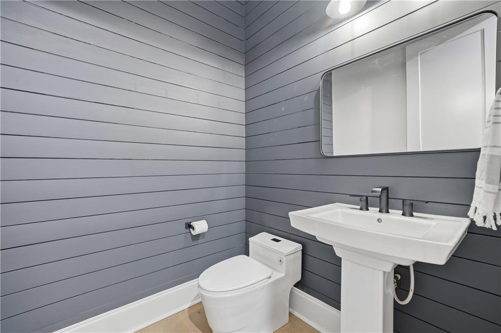320 Concord Street Alpharetta, GA 30009 - Photo 37 of 48 a bathroom with a sink a toilet and mirror