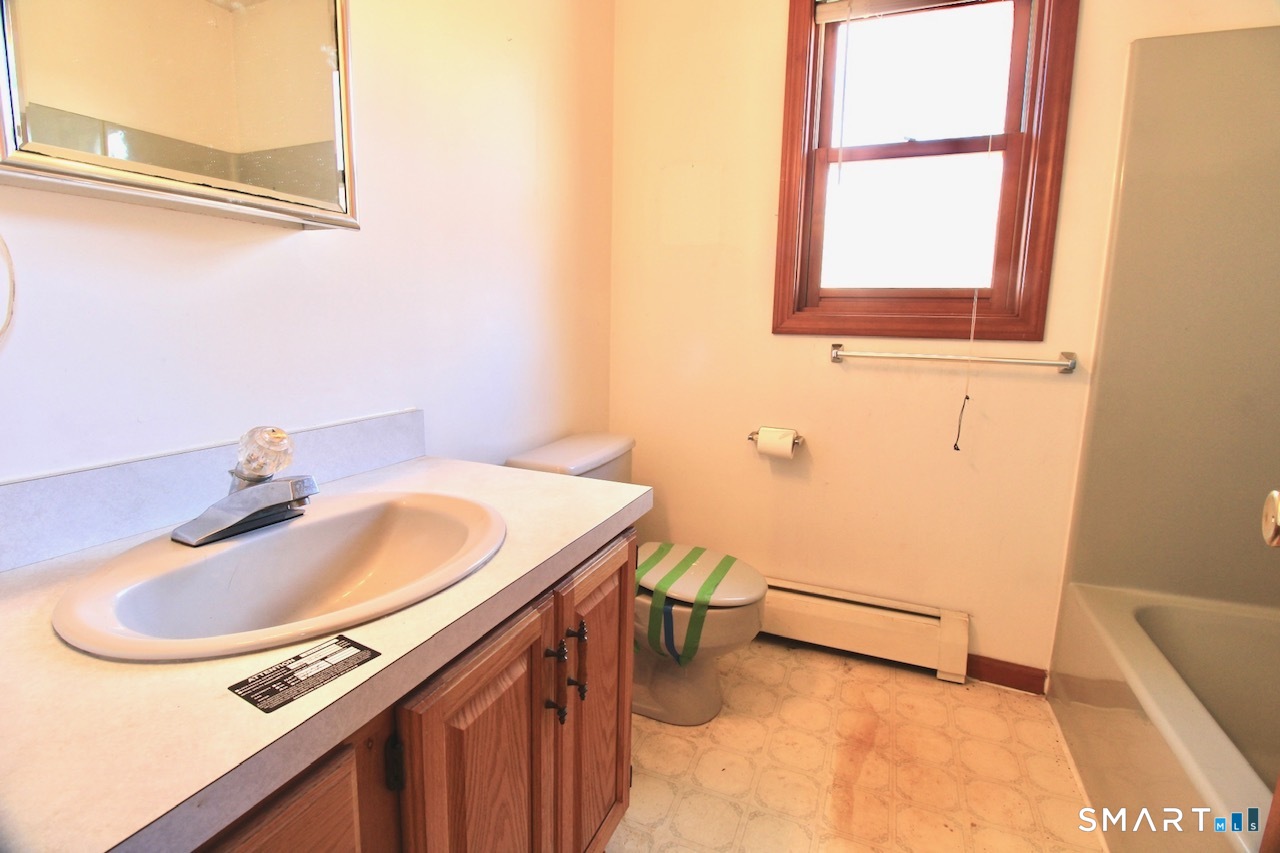 6 North Lane Wallingford, CT 06492 - Photo 24 of 34 a bathroom with a sink and a mirror
