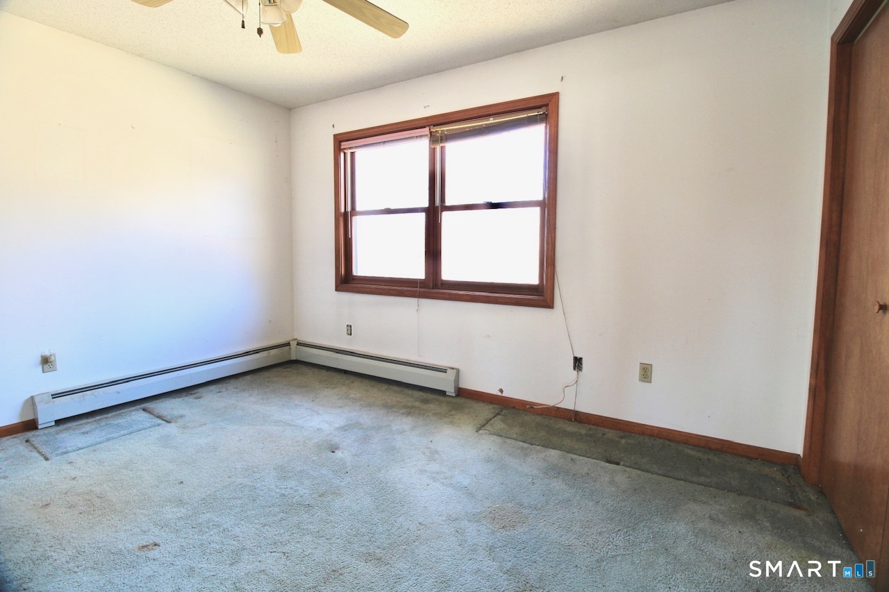 6 North Lane Wallingford, CT 06492 - Photo 28 of 34 an empty room with a window