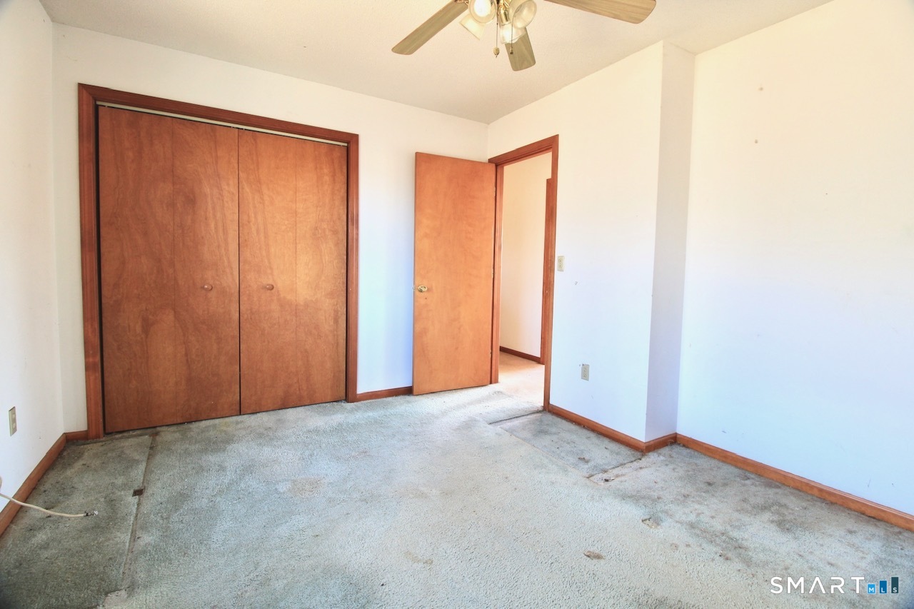 6 North Lane Wallingford, CT 06492 - Photo 29 of 34 an empty room with a empty space and a window