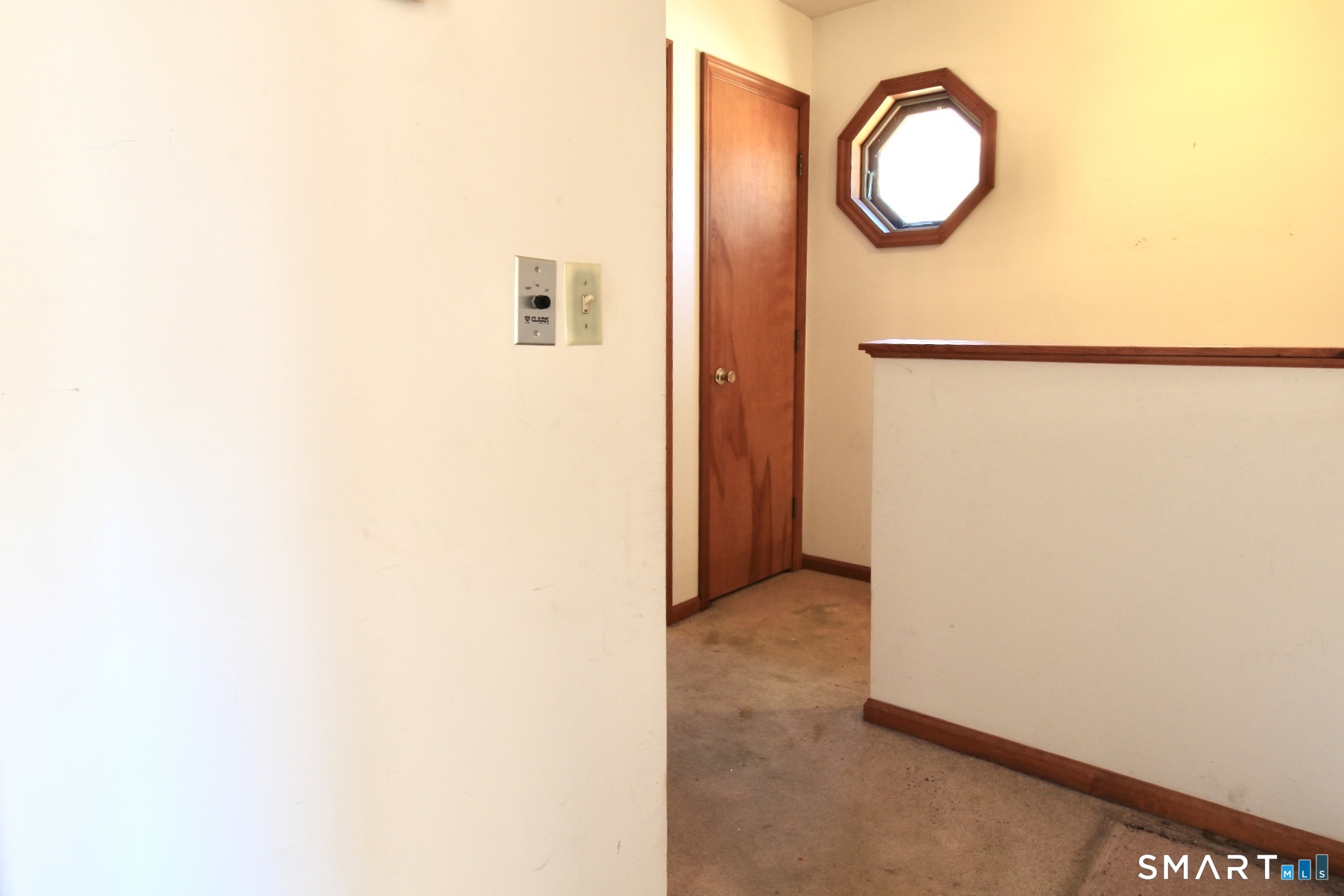 6 North Lane Wallingford, CT 06492 - Photo 32 of 34 a view of a room with wooden floor and white walls