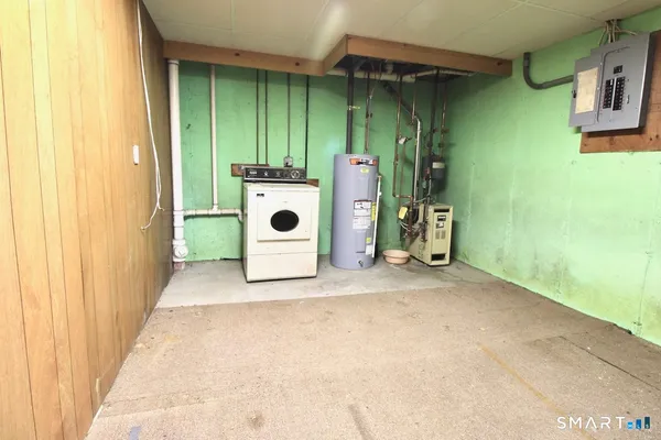 a view of a storage & utility room with washer and dryer