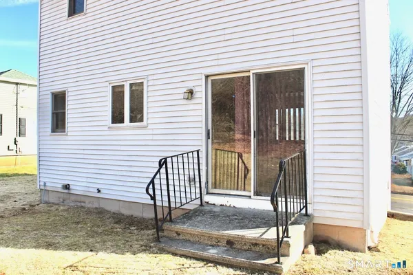 a front view of a house with a porch