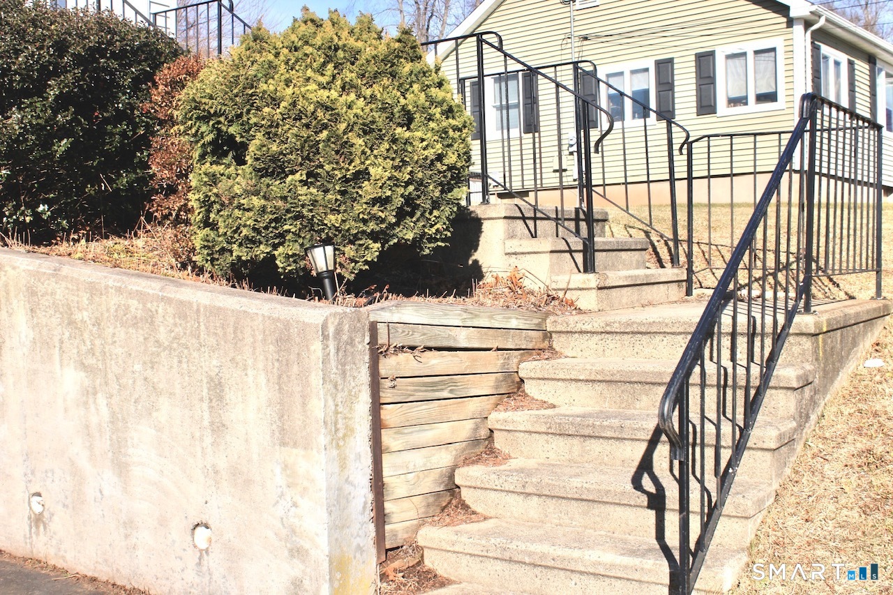6 North Lane Wallingford, CT 06492 - Photo 8 of 34 a view of a house with a large window