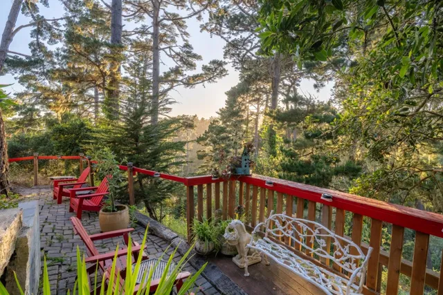 a view of outdoor sitting area with furniture