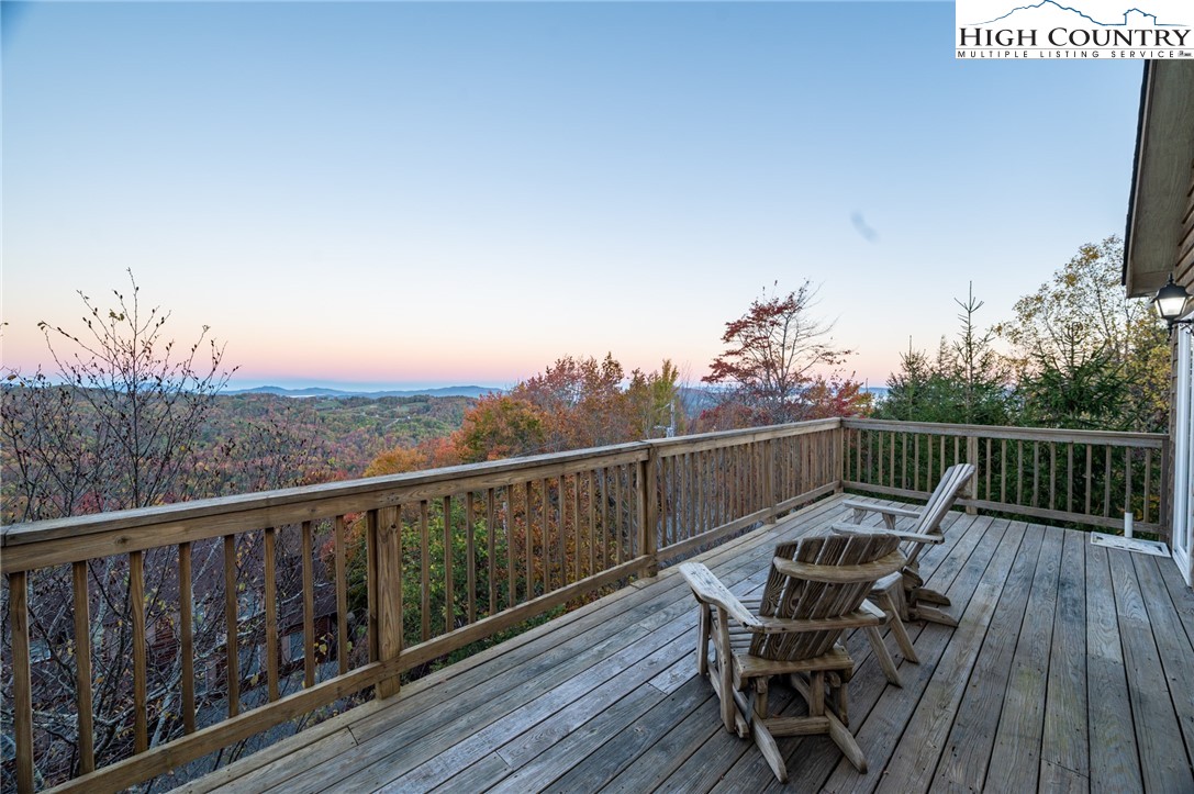 309 Pinnacle Ridge Road Beech Mountain, NC 28604 - Photo 35 of 45 a view of a balcony with wooden floor and seating space