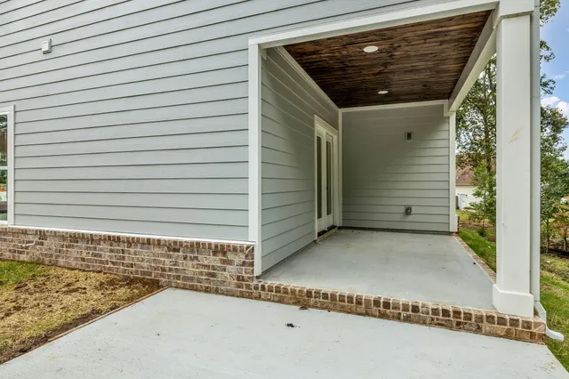 a front view of a house with yard