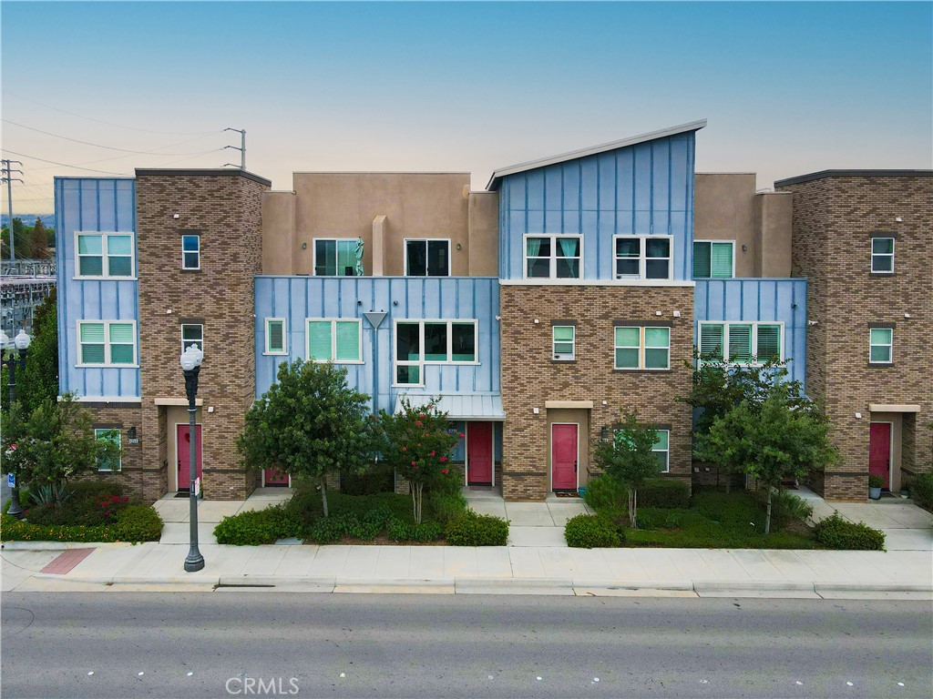 4956 Arrow, Unit D Montclair, CA 91763 - Photo 1 of 1 a view of building with a street