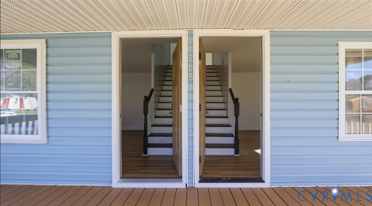 205 Cobb Street Franklin, VA 23851 - Photo 12 of 57 View of exterior entry with a deck