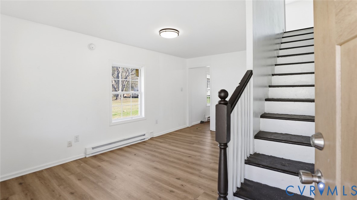205 Cobb Street Franklin, VA 23851 - Photo 17 of 57 a view of entryway with wooden floor