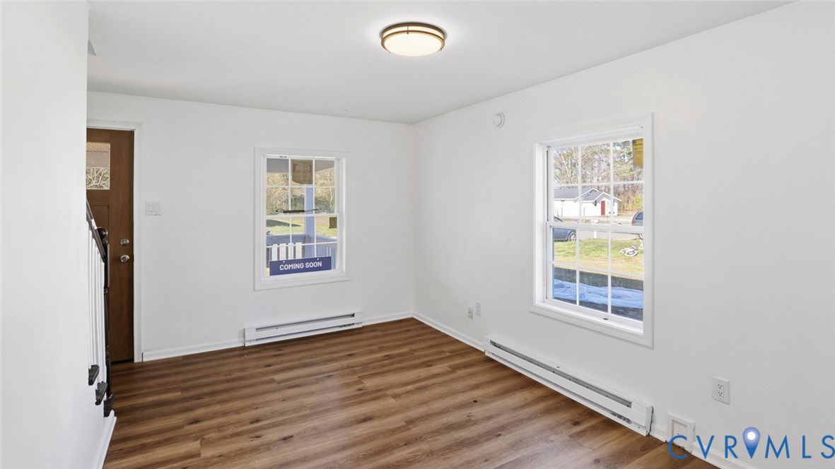 205 Cobb Street Franklin, VA 23851 - Photo 20 of 57 an empty room with windows