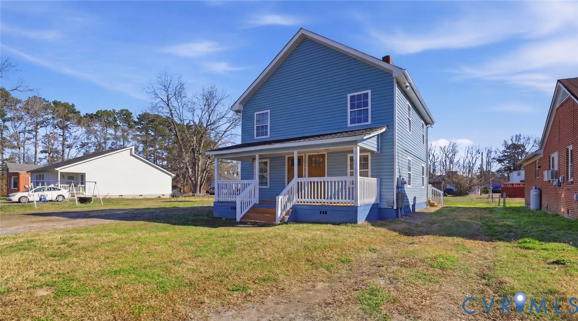 205 Cobb Street Franklin, VA 23851 - Photo 2 of 57 a front view of house with yard