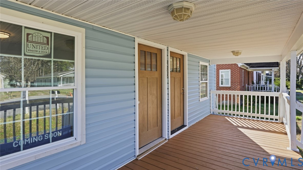 205 Cobb Street Franklin, VA 23851 - Photo 23 of 57 a view of a balcony with wooden floor