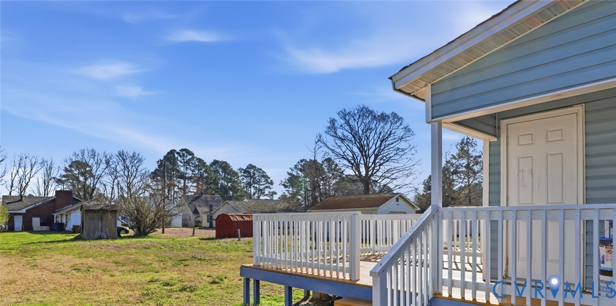205 Cobb Street Franklin, VA 23851 - Photo 25 of 57 a view of a house with backyard and trees