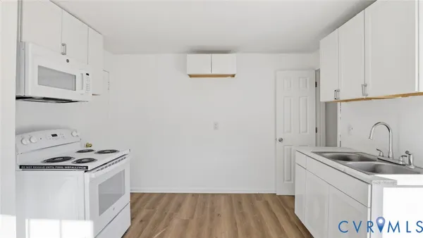 a view of empty room with windows