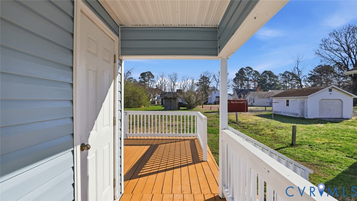 205 Cobb Street Franklin, VA 23851 - Photo 41 of 57 a view of balcony with wooden floor and fence