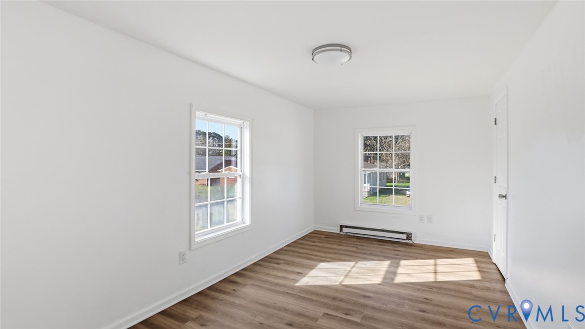 205 Cobb Street Franklin, VA 23851 - Photo 45 of 57 a view of empty room with windows