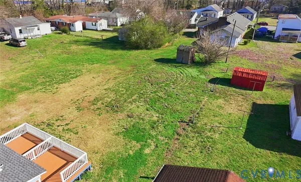 an aerial view of residential house with outdoor space