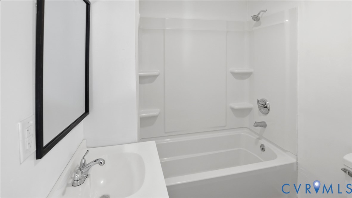 205 Cobb Street Franklin, VA 23851 - Photo 51 of 57 a bathroom with a bathtub and shower