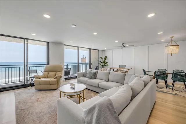 a living room with furniture fireplace and a flat screen tv