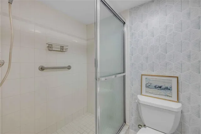 a view of a balcony with a patio