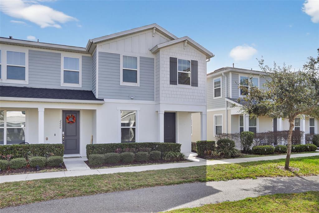 2222 Gopher Tortoise Terrace Oakland, FL 34787 - Photo 1 of 51 a front view of a house with a yard and garage