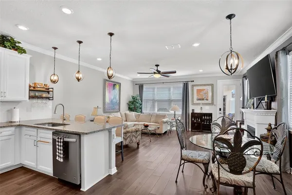 a view of a kitchen and dining area with furniture